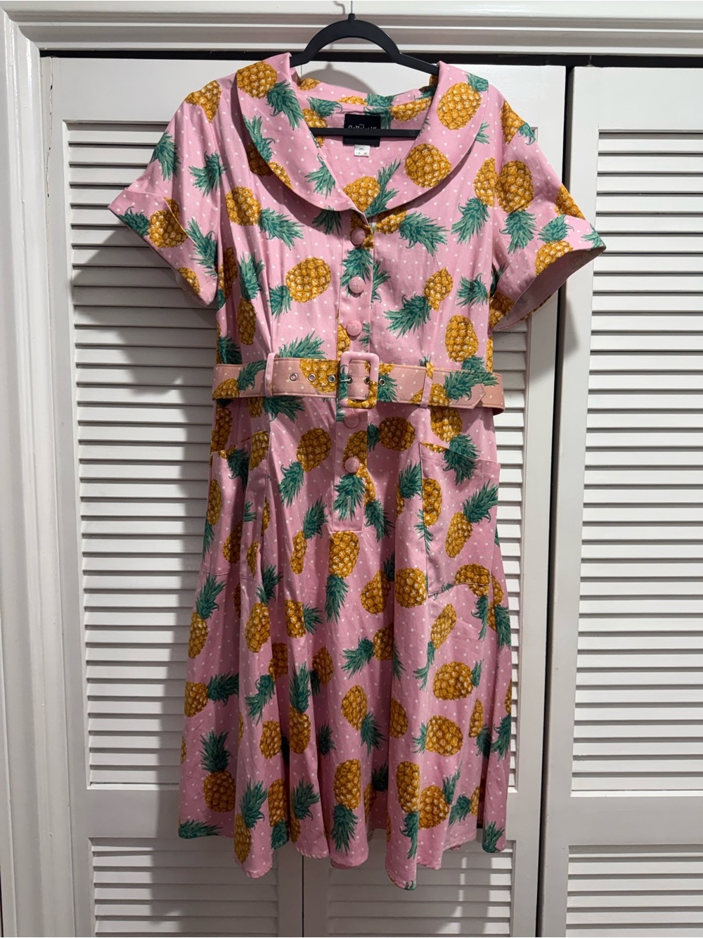 Label inside pink floral garment